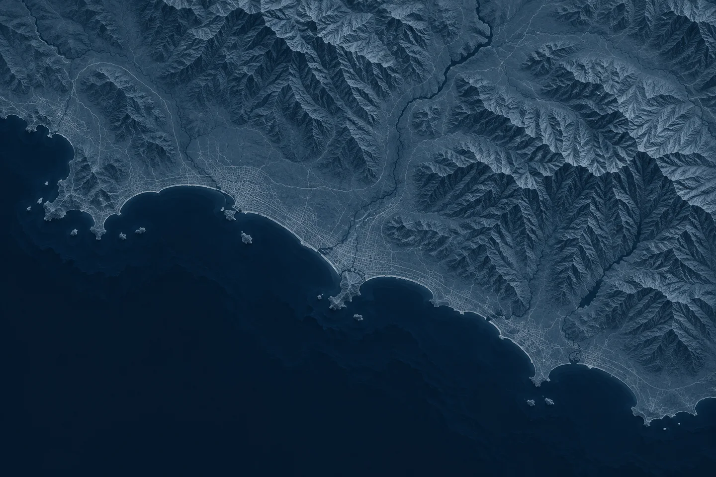 Stylised topographic coastal map showing terrain, roads and urban areas